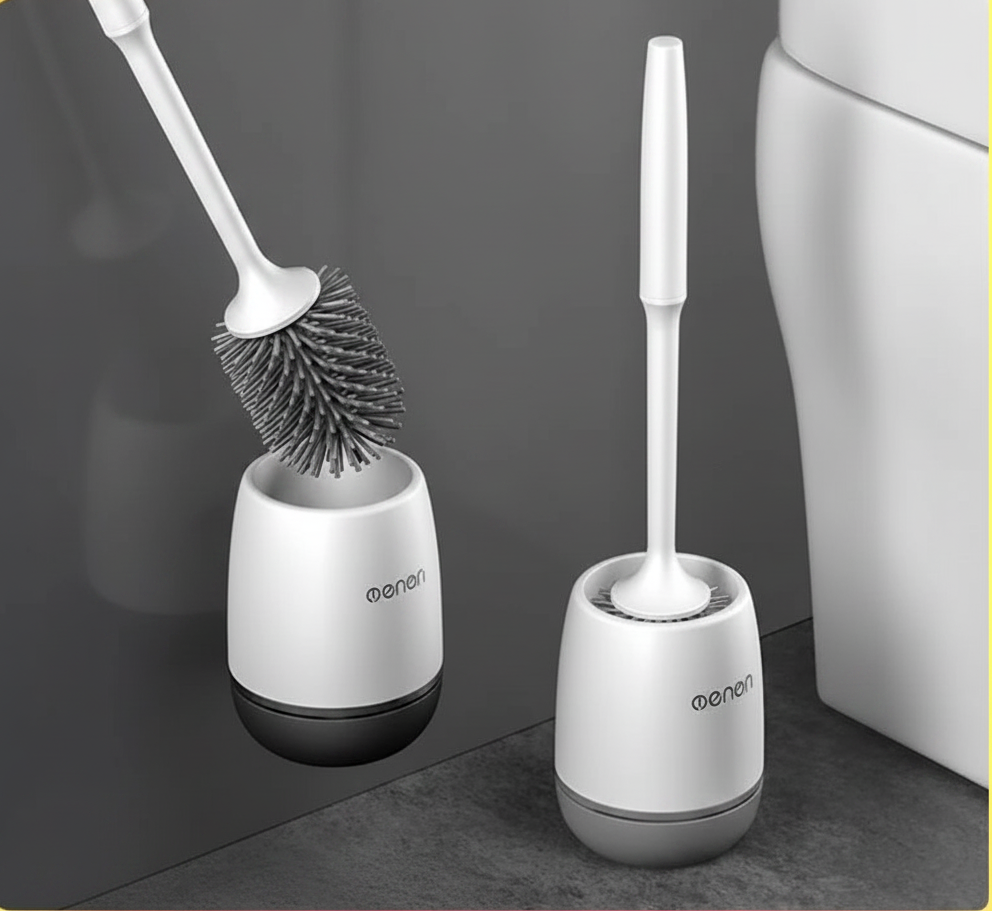 Two toilet cleaning brushes with holders on a gray surface, featuring the MENGNI brand.